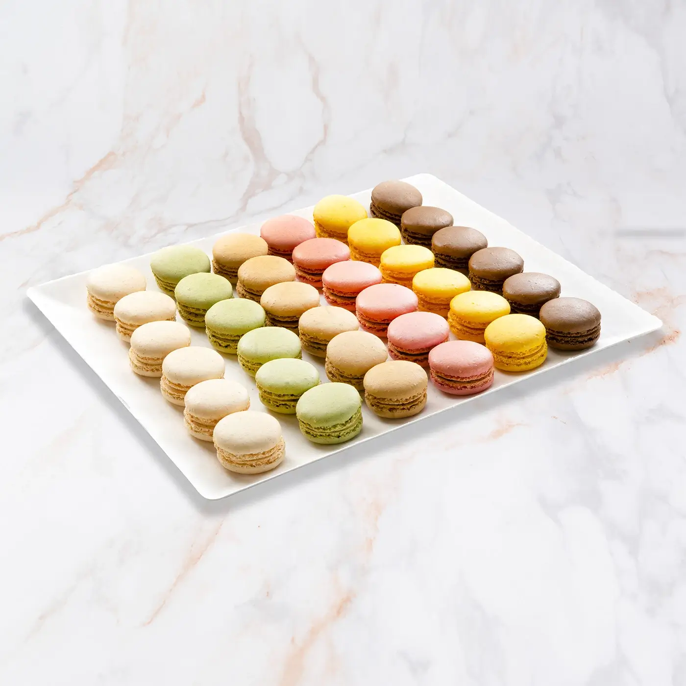 Macarons premium pour événements particuliers ou en entreprise. Livraison à Paris & IDF. Commandez chez Jardins d’Epicure.