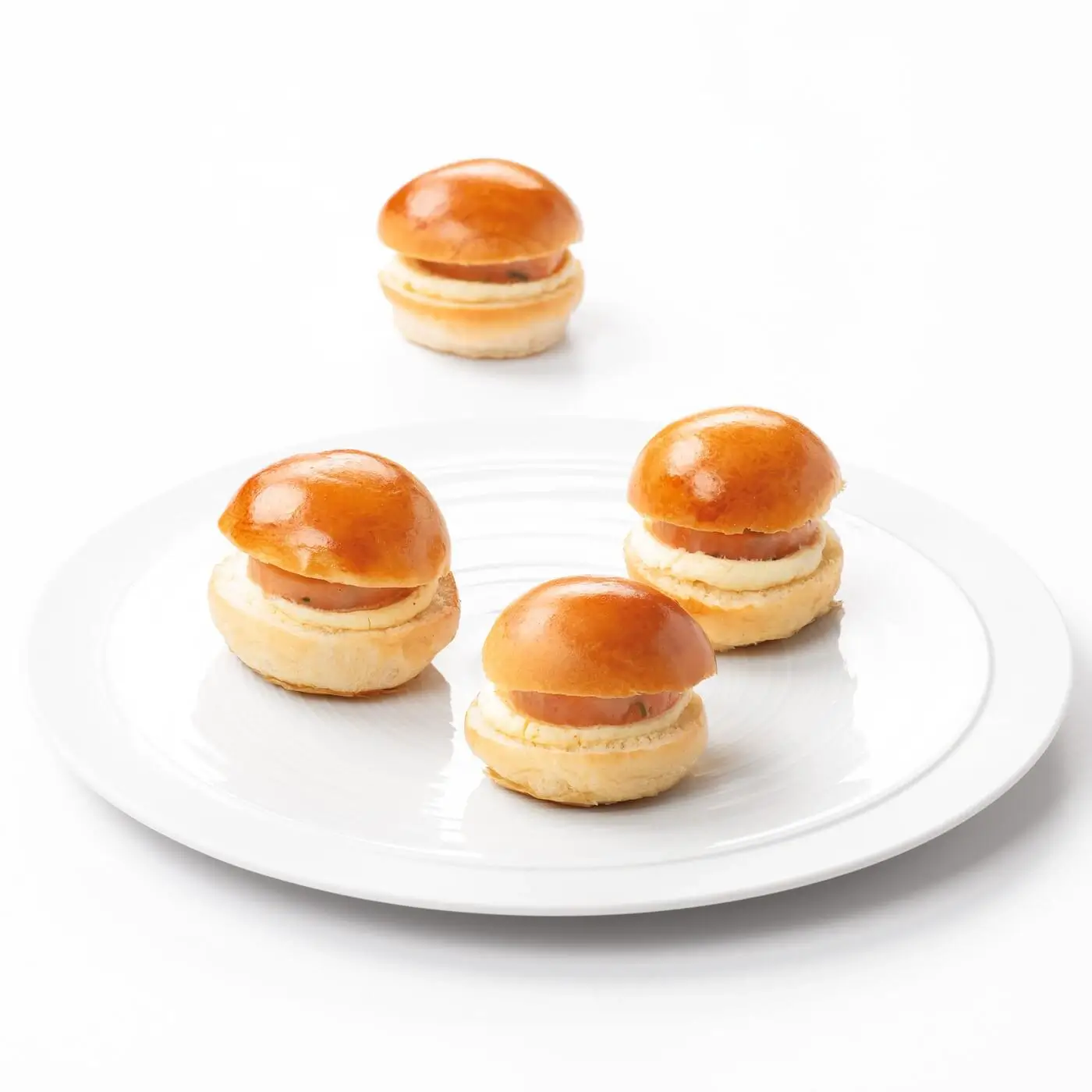 Mini brioches saumon et mascarpone pour vos événements de fin d'année - Jardins d'Epicure traiteur